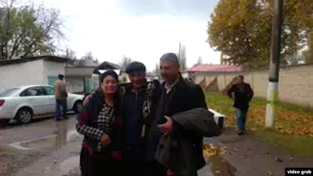 Murod Juraev (center) after his release from prison