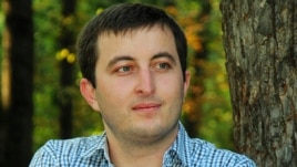 TV news presenter Kazbek Gekkiyev 