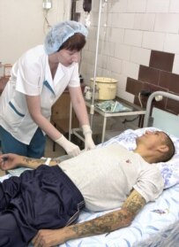 A patient receives treatment in Russia last month after drinking counterfeit vodka (ITAR-TASS)