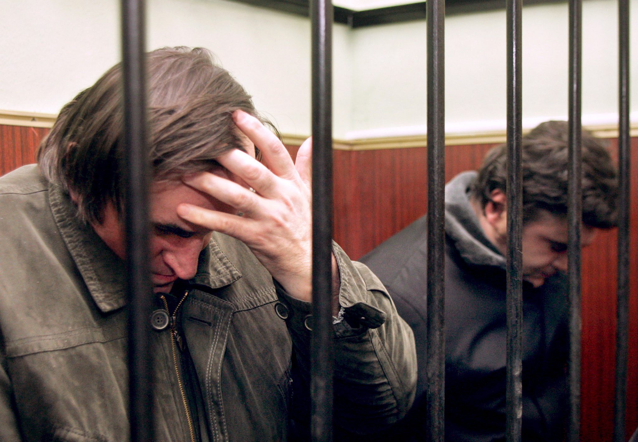 Mykola Protasov and Valeriy Kostenko in court in December 2005