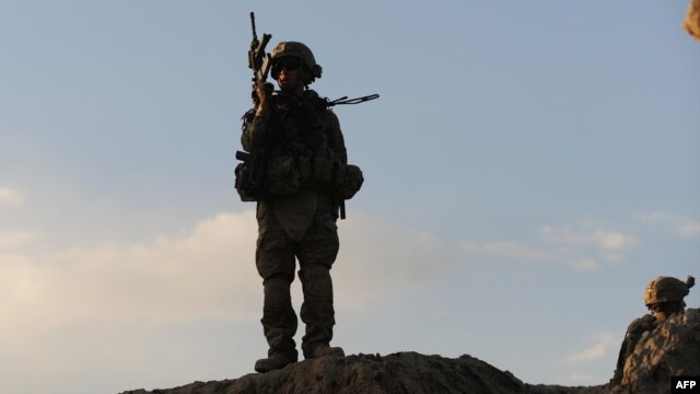 U.S. soldiers patrol near Baraki Barak base in Afghanistan's Logar Province.