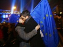 A Romanian couple celebrate in Bucharest as Romania entered the EU in January 2007 (AFP)