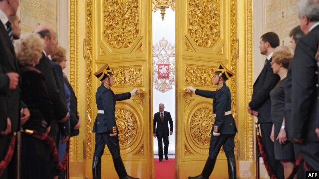 Russian President Vladimir Putin (center) in the Great Kremlin Palace during his inauguration ceremony on May 7. 