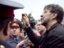 Russia -- Yuri Shevchuk and  Artemy Troitsky trying to convince  militiamen (police) to let them sing on  Pushkinskaya square in Moscow on meeting to protect Khimki forest , 22Aug2010