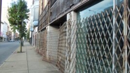 Closed shops line S. 4th Street in Steubenville, Ohio