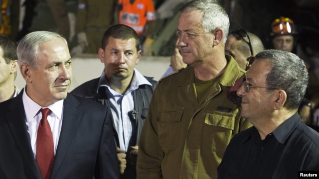 Even as Israel's Prime Minister Benjamin Netanyahu (left) continues to talk of a "red line" Iran's nuclear program must not cross, Defense Minister Ehud Barak (right) has suggested that that line may have moved.