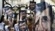 Members of the Paris-based media watchdog Reporters Without Borders protest the lack of press freedom in Iran outside Iranian Embassy in Paris in May 2010. 