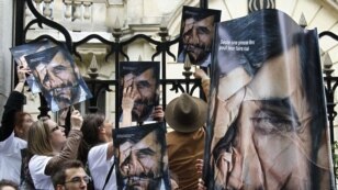 Members of the Paris-based media watchdog Reporters Without Borders protest the lack of press freedom in Iran outside Iranian Embassy in Paris in May 2010. 