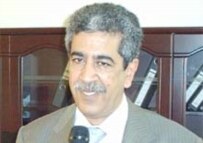 Mukhtar Lamani speaking to RFI in Baghdad on May 28 (RFE/RL)