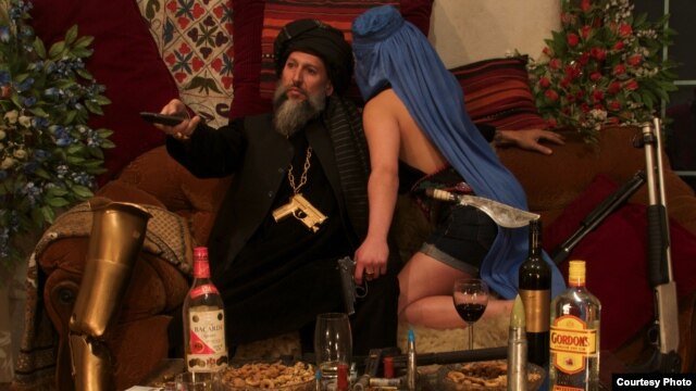 Aman Mojadidi poses as a "jihadi gangster" in a photo titled "After a Long Day's Work," part of the "A Day in the Life of a Jihadi Gangster" photo series.