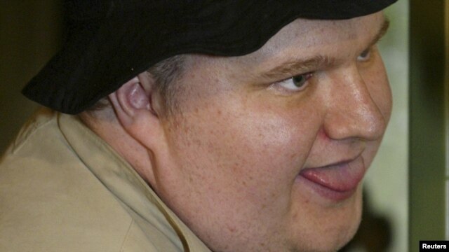 Internet millionaire Kim Dotcom pictured during his trial for insider trading and embezzlement in 2002