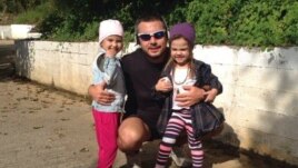 Керим Токаев с дочками. Фото из семейного архива