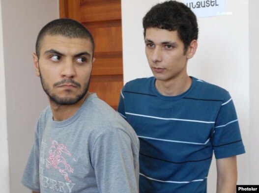 Armenia -- Opposition activists Davit Kiramijian (L) and Sargis Gevorgian at the start of their trial in Yerevan, 14July 2010.