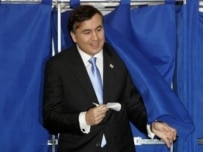 Mikheil Saakashvili exits a polling booth on January 5 (AFP)