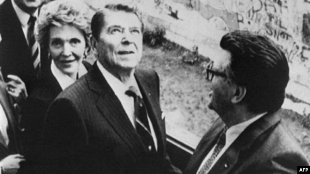 U.S. President Ronald Reagan tours the Berlin Wall before delivering his speech.