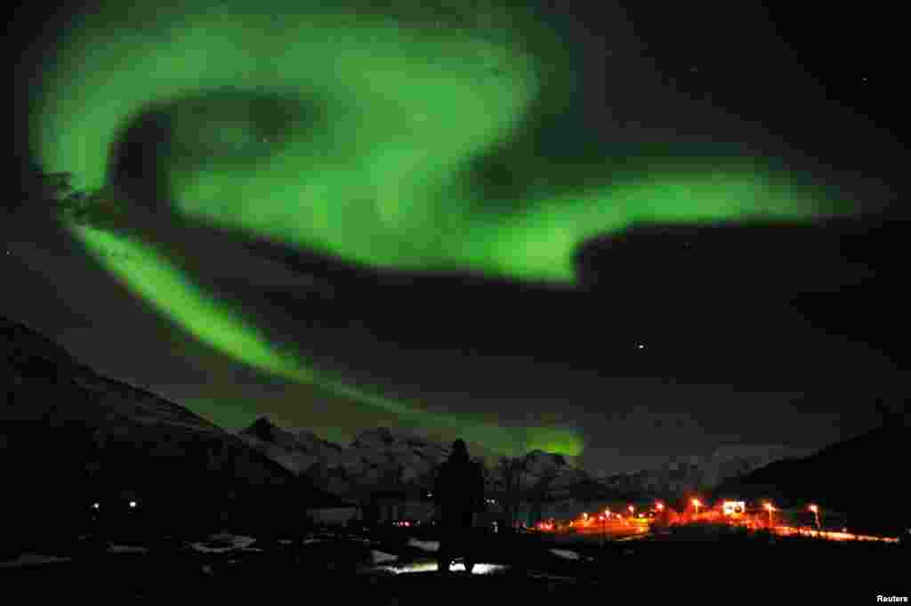 The aurora borealis lights up the sky near the city of Tromsoe in northern Norway on January 25. Reuters/Rune Stoltz Bertinussen/Scanpix