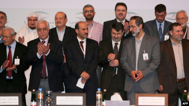 Pjesetarë të grupit opozitar sirian