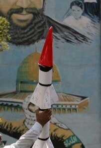 An anti-Israel demonstrator in Tehran on July 18 (Fars)