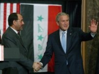 Bush (right) expressed support for al-Maliki (left), but his administration's patience is beginning to wear (epa)