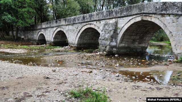 A bridge spans the Bosna River in Bosnia in September.