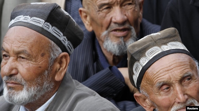 Ethnic Uzbeks attend a rally in the town of Jalalabad in April 2010.
