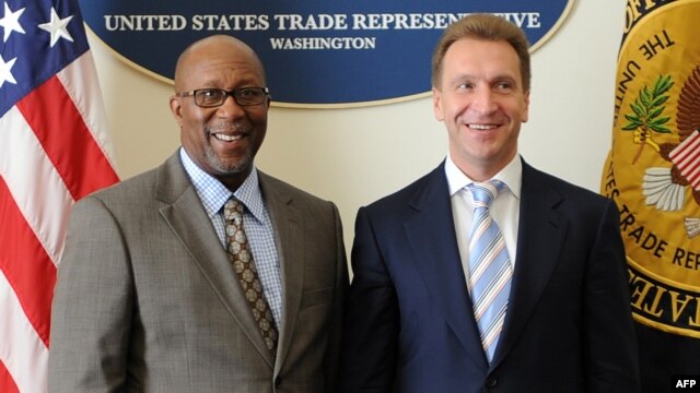 U.S. Trade Representitive Ron Kirk (left, with Russian Deputy Prime Minister Igor Shuvalov) said repealing the Jackson-Vanik amendment would ensure that U.S. companies will benefit from Russia's entry into the World Trade Organization.