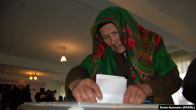 An Osh resident votes in local elections on March 4. 