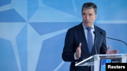 NATO chief Anders Fogh Rasmussen described the new deployments as being about "defense, deterrence, and de-escalation," and said they were "entirely in line" with NATO's international commitments governing the activities of military forces.