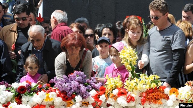 Armenians lay flowers at the Armenian Genocide Memorial in Yerevan on April 24. 