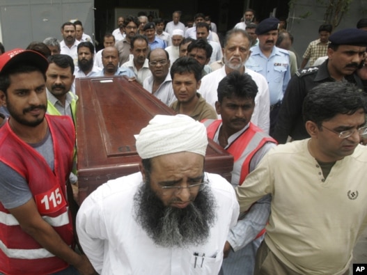 Mourners carry the coffin of journalist Syed Saleem Shahzad, who was killed in Pakistan this week. The country was listed by the Committee to Protect Journalists as one of the worst offenders in its 2011 Impunity Index