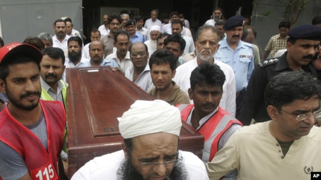 Mourners carry the coffin of journalist Syed Saleem Shahzad, who was killed in Pakistan this week. The country was listed by the Committee to Protect Journalists as one of the worst offenders in its 2011 Impunity Index