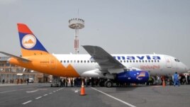 Armenia - Passengers board an Armavia airline flight at Yerevan's Zvartnots airport.
