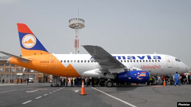 Armenia - Passengers board an Armavia airline flight at Yerevan's Zvartnots airport.