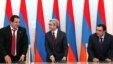 Armenian President Serzh Sarkisian (center), Orinats Yerkir Party leader Artur Baghdasarian (right), and Prosperous Armenia Party leader Gagik Tsarukian (left) signed a coalition agreement in February 2011.
