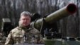Ukrainian President Petro Poroshenko speaks to Ukrainian servicemen during a visit to a military unit outside the capital, Kyiv. According to the Prosecutor-General's Office, 1,600 soldiers were killed in 2014 and 1,130 soldiers in 2015.
