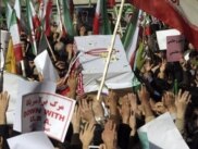 People take part in the funeral of Sanee Zhaleh, a student who was shot dead during a recent opposition rally in Tehran.