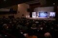На сцэне ўсталявалі вялікі экран, зь якога вядзецца відэатрансьляцыя зьезду