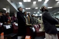 Members of Afghanistan's parliament are sworn in on 19 December (epa)