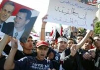 Syrians demonstrating in Damascus in October 2005 in opposition to the UN probe into the Hariri killing (AFP)