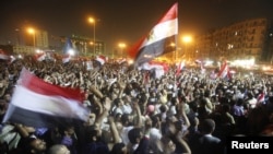 Egyptian protesters chant slogans against the military council on Tahrir Square in Cairo on June 20.