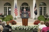 Bush answers questions in the White House's Rose Garden on June 14 (epa)