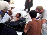 A boy wounded in the July 10 suicide attack that killed 12 children in southern Afghanistan (AFP)