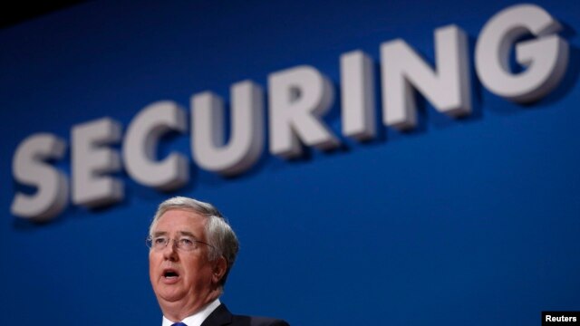 U.K. Defense Secretary Michael Fallon says he is 'worried about Putin' and the way 'he is testing NATO.'