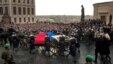 A caisson with the flag-draped coffin of former Czechoslovak dissident and Czech President Vaclav Havel arrives at Prague Castle on December 21, accompanied by his widow and surrounded by mourners.