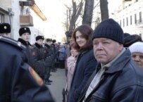 Moldovans wait outside the Romanian Embassy in Chisinau for visas in January (AFP)