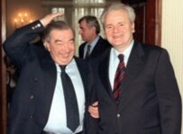 Former Serbian President Slobodan Milosevic pictured with Russian Prime Minister Yevgeny Primakov (left) after talks about the situation in Kosovo in March 1999. (file photo) (epa)