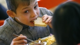 A child has a meal at an orphanage in the southern Russian city of Rostov-na-Donu.