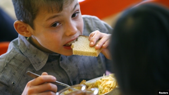 A child has a meal at an orphanage in the southern Russian city of Rostov-na-Donu.