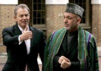 British Prime Minister Tony Blair (left) and Afghan President Hamid Karzai in London yesterday for the start of Afghan aid talks (epa)