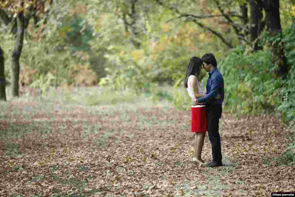 Before getting married, many Kazakh couples do a photo shoot. They will use a photo for their wedding invitation.